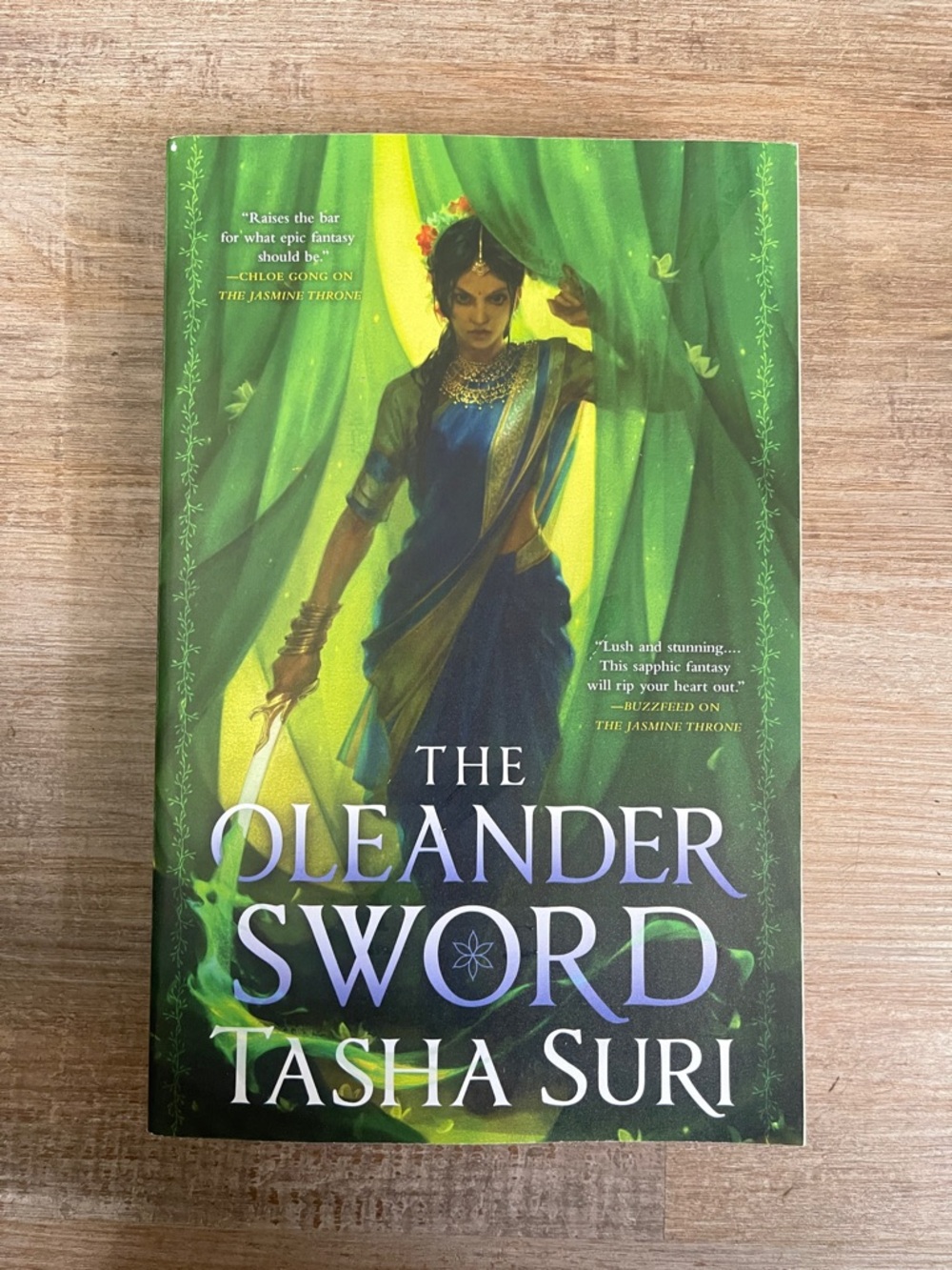 The Oleander Sword by Tasha Suri - Green & Purple Fantasy Paperback